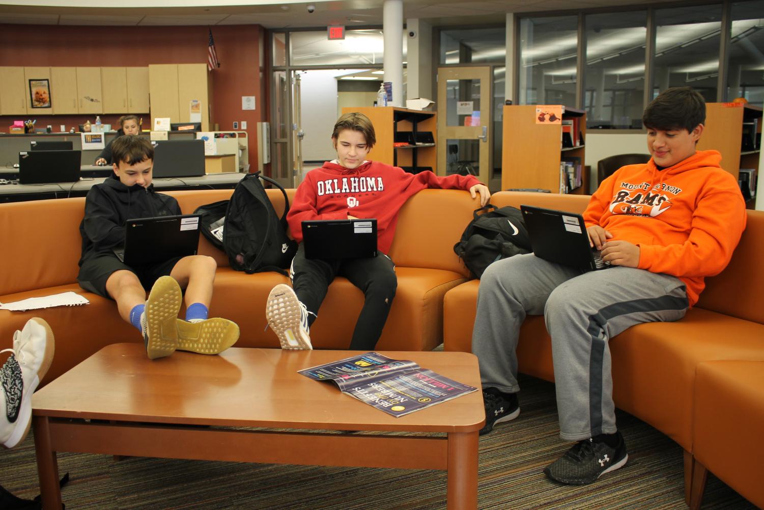 Students work on their Chromebooks in the Media Center. Some students use the Media Center during study hall periods.